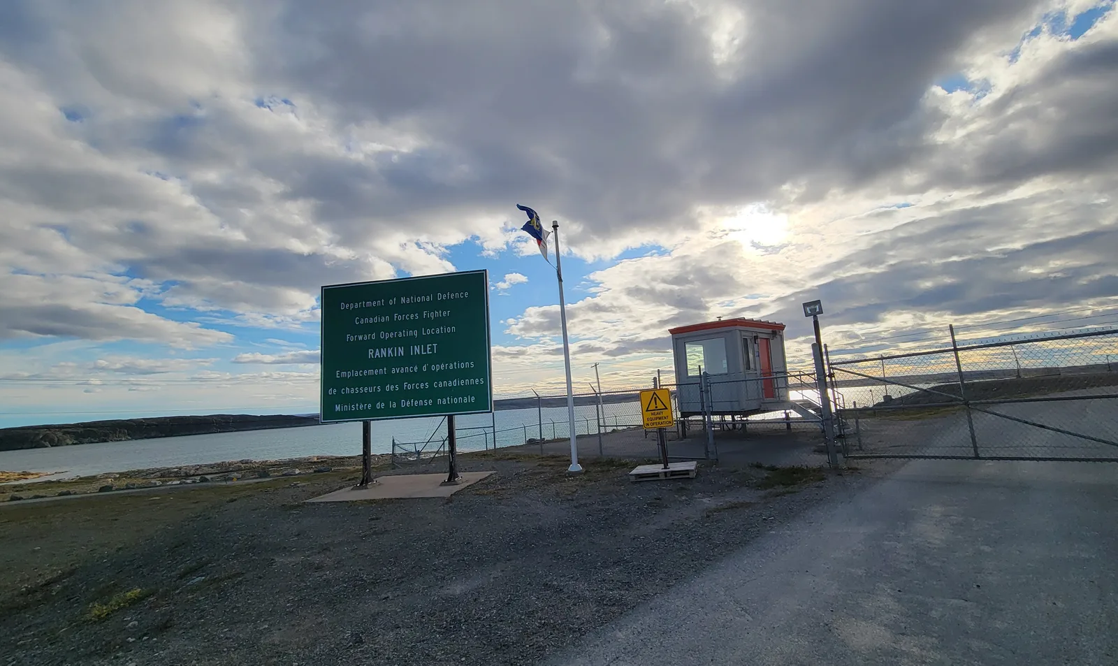 A bilingual Department of National Defence sign marks the fighter forward operating location at Rankin Inlet.